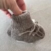 Huttelihut Gestrickte Babyschuehchen Alpaca Camel Melange 2 Huttelihut Gestrickte Babyschuehchen Alpaca Camel Melange -Babybekleidungs geschäft IMG 4341