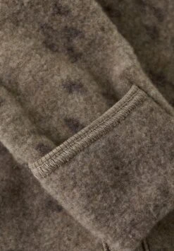 Huttelihut Wollfleece Overall Savanna Melange Muster 7 Huttelihut Wollfleece Overall Savanna Melange Muster -Babybekleidungs geschäft huttelihut wollfleece overall sesammelange biowolle coucounatur